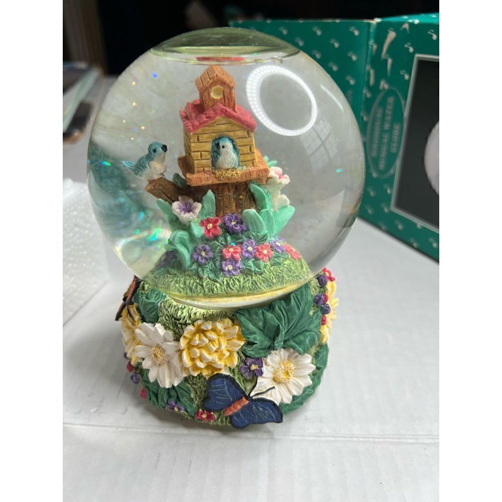 Vintage birdhouse musical water globe